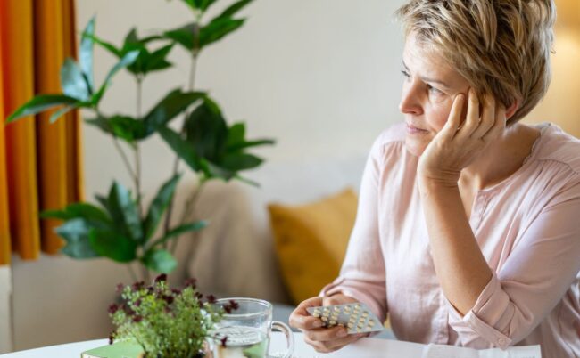 femme ménopausée avec symptômes